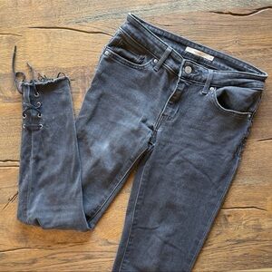 Levi’s gray black tie jeans